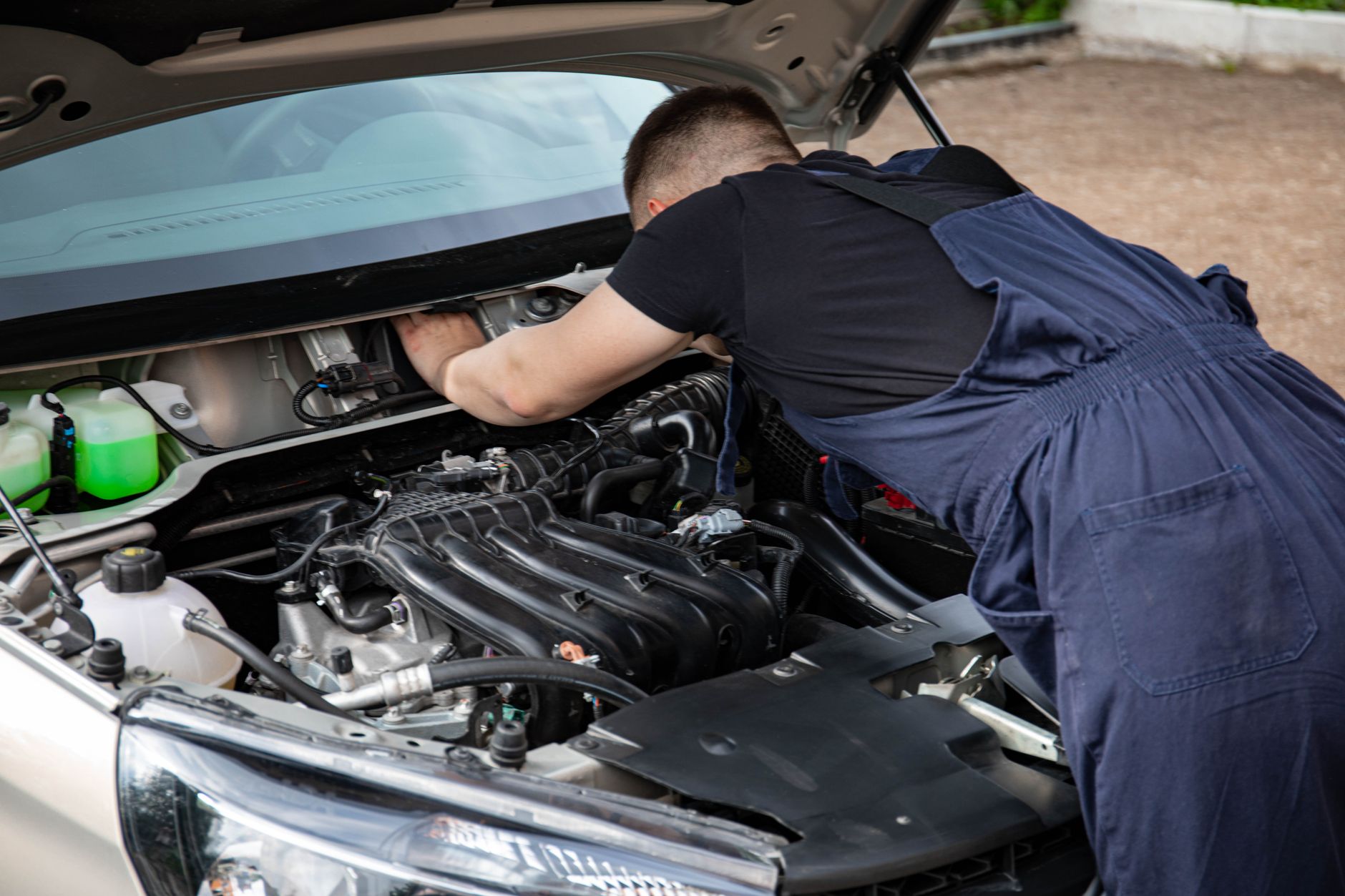 Checking degraded engine oil on a wet belt timing system vehicle during a pre-sale inspection
