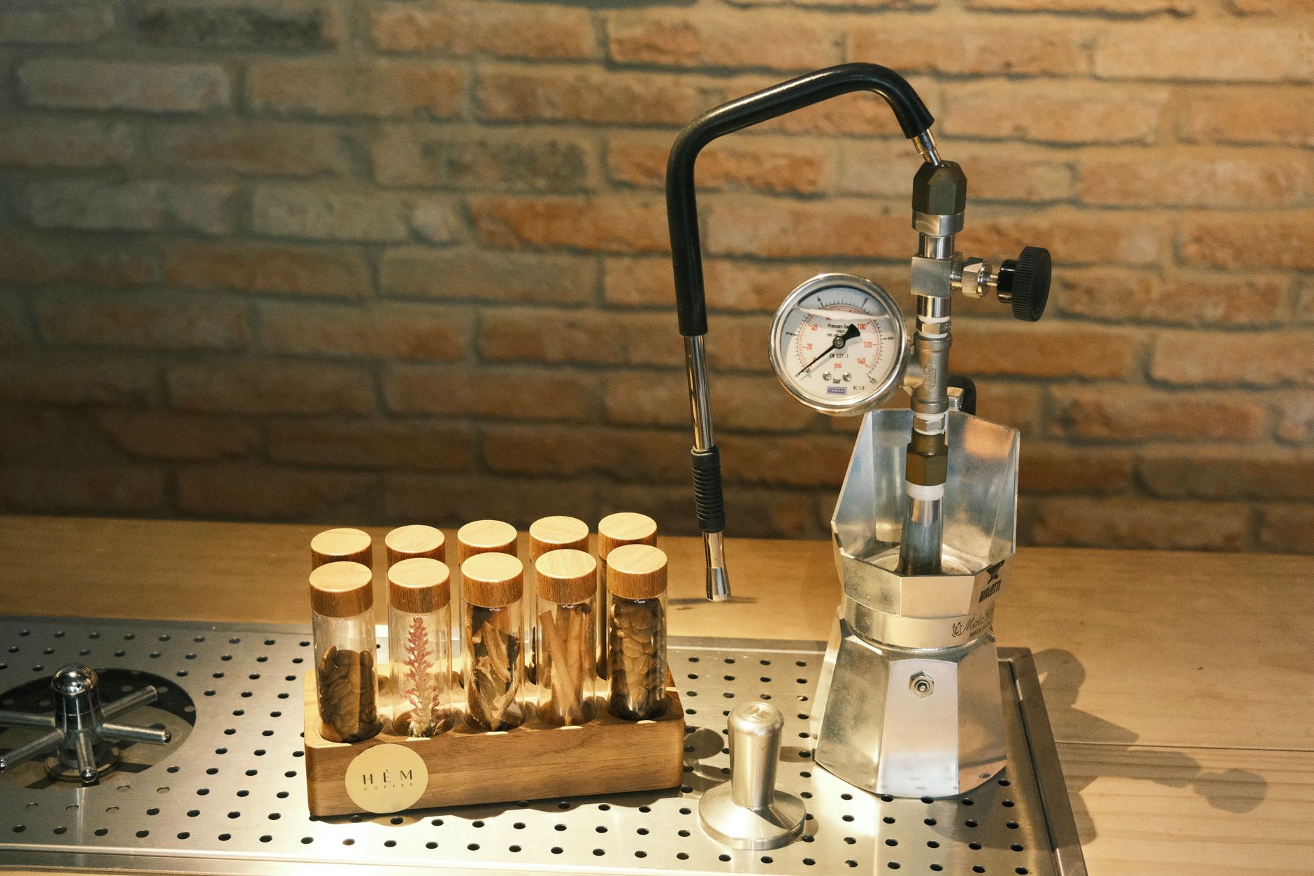 Mechanic performing a coolant pressure test on a turbocharged petrol engine to diagnose coolant system failures